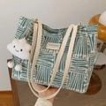 Green and white geometric woven tote bag with leather straps and cloud pendant - Green with Pendant