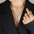 Luxury gold crown necklace with letter U pendant and zircon accents on twist chain - Letter U / Gold