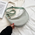 Light green nylon crescent crossbody bag with adjustable strap on white fabric - Green