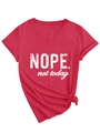 Detail of red V-neck T-shirt with 'NOPE. not today' slogan and stylish side-knot hem - Red (White Font)