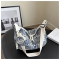 Blue and white plaid tote bag detail with wide strap and matching round coin purse charm - Blue