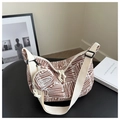 Detail of checkered crescent bag with wide fabric strap and matching round coin pouch - Orange