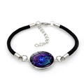 Detail of hand-woven Pisces constellation bracelet with blue neon glass pendant and silver clasp - Pisces (12Pisces) / Black