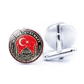 Detail of silver cufflinks featuring Istanbul Turkey flag and mosque architectural design - Turkey