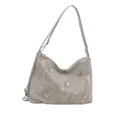 Grey crinkled tote bag with five golden butterfly metal accents and long shoulder strap - Silver