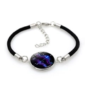 Adjustable black braided Sagittarius constellation bracelet with neon glass dome charm - Black