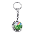 Detailed macro of a rotating green four-leaf clover pendant on a silver keychain - Rainbow Background Clover Style (JY009293-12)