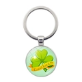 Green luck clover keychain with Good Luck ribbon on a round metallic pendant - Yellow Ribbon Style