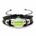 Close-up of leather bracelet featuring a GOOD LUCK glass dome and braided cord details - Horseshoe Clover Style (JY009291-6)