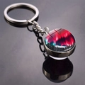 Double-sided glass ball aurora keychain featuring snowy mountains and red northern lights - Aurora Snowy Mountain Style (JY009320-11)