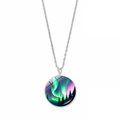 Macro detail of aurora borealis glass pendant with silver chain and forest silhouette - Pink Purple Aurora Pine Forest (JY009322-5)