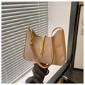 Close-up of beige leather shoulder bag with golden chain and sleek metallic clasp - Khaki