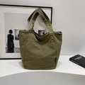 Army green tote bag in pleated nylon fabric with spacious interior and shoulder straps - Green