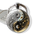 Detailed close-up of Yin Yang Tai Chi keychain with celestial galaxy and gold leaf patterns - Galaxy Moon Tai Chi Style (JY009351-7)