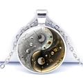 Macro view of yin yang necklace featuring a creative cosmic moon and starry sky design - Golden Liquid Sky Style (JY009349-7)
