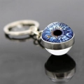 Creative blue eye glass ball keychain with silver metal ring on reflective black surface - Deep Blue Iris Style (JY009359-7)