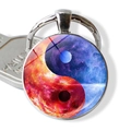 Yin Yang Tai Chi glass cabochon keychain featuring a blue nebula galaxy style pattern - Nebula Yin Yang Style (JY009351-2)