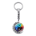 Rotating Yin Yang Bagua keychain with crescent moon hollow metal design and galaxy nebula glass - Nebula Colorful Style (JY009352-4)