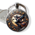 Detailed view of Halloween witch pendant with glass dome and silver alloy keychain - Maple Leaf Wizard Flight(JY009410-7)