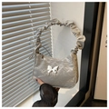 Detail of silver pleated hobo bag with metallic butterfly logo and Y2K ruched handle - Silver