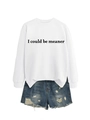 Flat lay of a white crewneck sweatshirt with black slogan text and distressed denim shorts - White Sweatshirt (Black Font)