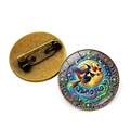 Detail of vintage bronze witch brooch showing fantasy artwork and secure pin clasp - Bronze Starry Mandala (Bronze-6)