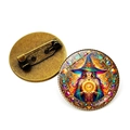 Detailed view of the front and back of a bronze witch brooch with a crystal glass dome - Bronze Wizard Crystal Ball (Bronze-4)