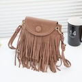 Bohemian brown tassel crossbody bag with suede texture and gold ring details - Camel