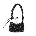 Borsa a mezzaluna in nylon nero con motivo a fiocchi bianchi e manico arricciato - Nero