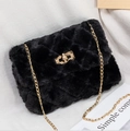 Chic black faux fur crossbody bag with gold chain and quilted plush texture - Black