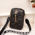 Schwarze VIFN Handytasche mit goldenem Quastenanhänger und Jacquard-Schultergurt - Schwarz