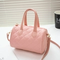 Classic pink quilted Boston handbag with golden hardware and adjustable crossbody strap - Pink