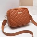 Brown quilted camera bag with V-shaped stitching and wide textile shoulder strap - Brown