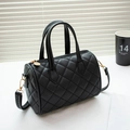 Black quilted boston bag with diamond stitching and elegant gold-tone hardware detail - Diamond Pattern Black