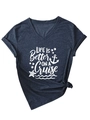 Detail of V-neck navy t-shirt featuring Life Is Better On A Cruise print and knot hem - Navy Blue (White Font)