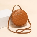 Caramel brown round handbag with heart-shaped quilting and adjustable strap - Tan