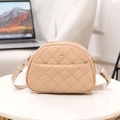 Apricot quilted crossbody bag with golden flower logo and adjustable strap - Apricot