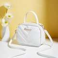 White mini crossbody handbag with V-shaped quilting and gold-tone hardware details - White