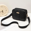 Modern black quilted crossbody bag with golden metal plaque and wide shoulder strap - Black