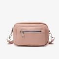 Sac à bandoulière minimaliste en similicuir rose avec poche zippée et sangle en tissu - Rose