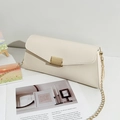 Elegant cream envelope chain bag with V-cut flap and textured gold-tone metal clasp - White