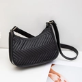 Elegant black quilted crescent underarm bag with V-shaped stitching and gold hardware - Black