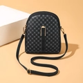 Women's black crossbody bag with gray circular patterns and gold metal buckle detail - Black
