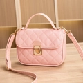 Chic light pink quilted handbag with gold turn-lock and adjustable shoulder strap - Pink