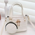 White quilted shoulder bag with gold flamingo hardware and matching round coin purse pouch - White