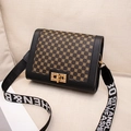 Retro geometric floral square bag with gold lock and wide lettered strap in brown - Black