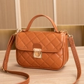 Brown quilted PU leather handbag with gold lock and adjustable crossbody strap - Brown