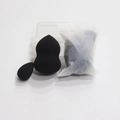 Detail of black beauty blender sponges in different sizes with clear storage box - Black Gourd With Mini Water Droppers (in A Frosted Bag)