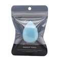 Detail of light blue hydrophilic makeup sponge in a translucent frosted zip-lock bag - Blue Water Drop
