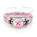Detail of pink leather bracelet with breast cancer awareness pink ribbon charm - Awareness Month Text Ribbon